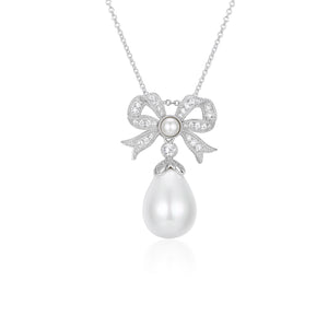 Open image in slideshow, &#39;Queen&#39; Bow and Pearl Drop Silver Pendant
