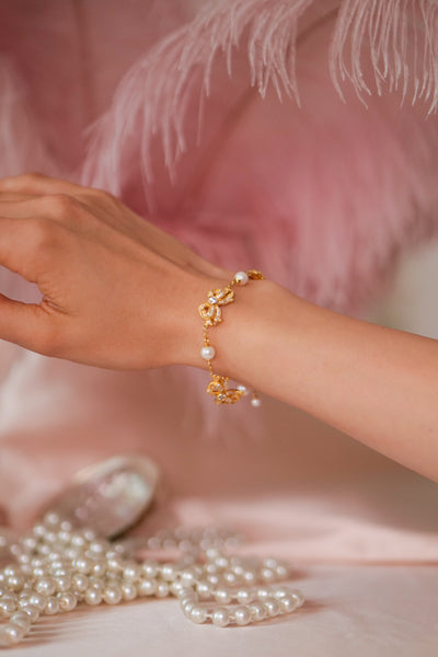 ‘Sissi’ Bow and Freshwater Pearl Gold Bracelet