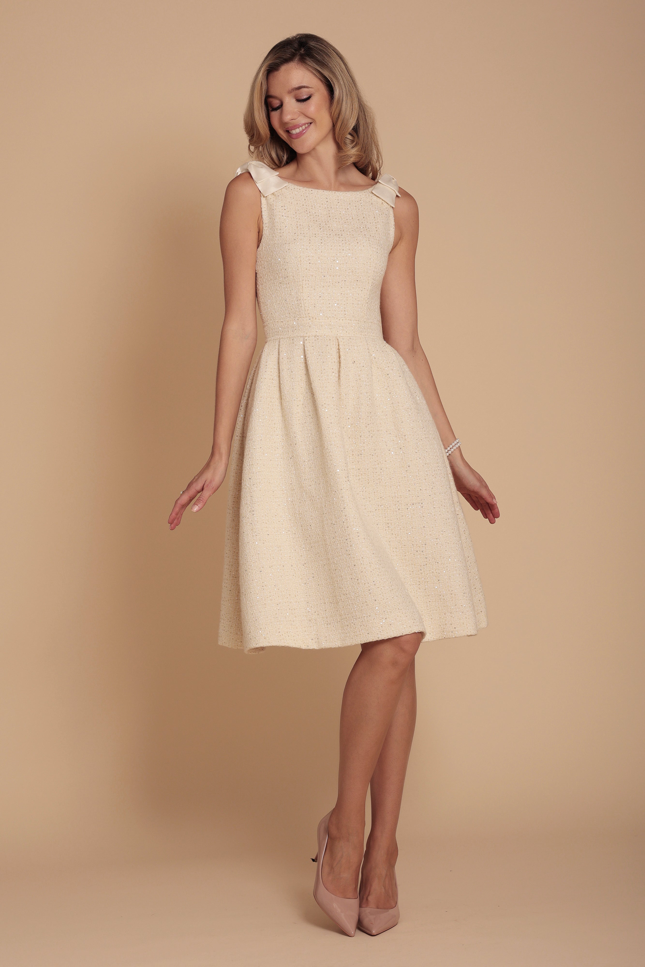 White Wool Tweed Dress with Bateau Neckline | Silk Taffeta Shoulder Bows & Pleated Skirt | Orpheum Collection | Santinni White Wool Tweed Dress with Bateau Neckline | Silk Taffeta Shoulder Bows & Pleated Skirt | Orpheum Collection | Santinni